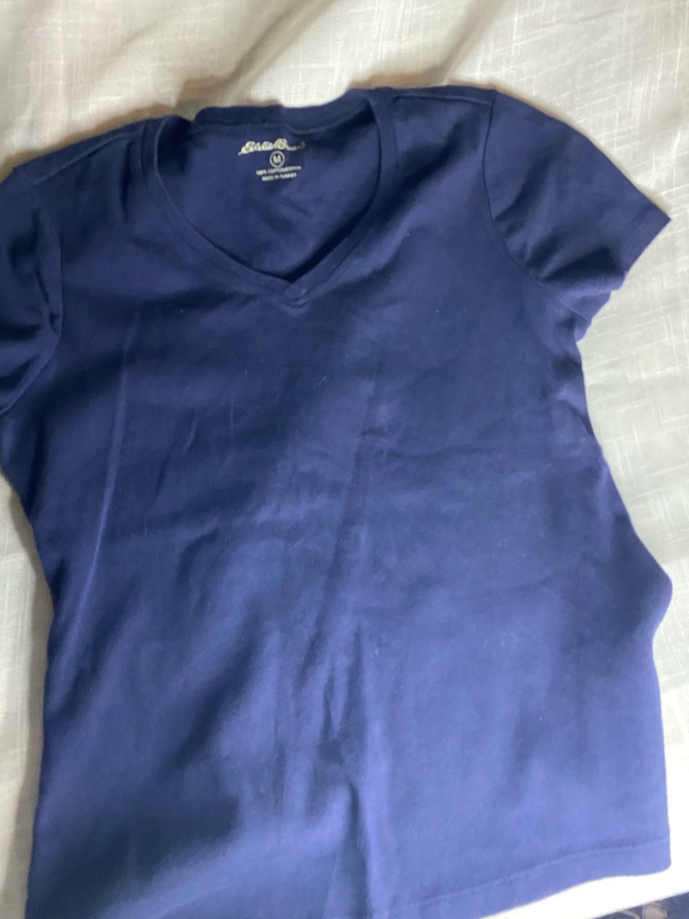 Eddie Bauer Navy T‑Shirt with Yellow Logo Print
